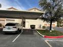 Assigned parking space in covered carport area; adjacent to condo building at 1830 N Buffalo Dr # 2098, Las Vegas, NV 89128