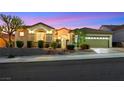 Inviting single-story home showcasing a neatly maintained lawn, attractive landscaping, and a tranquil neighborhood setting at 1960 Oliver Springs St, Henderson, NV 89052