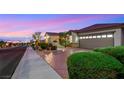 Lovely single-story house with a well-kept lawn, beautiful landscaping, and a quiet neighborhood feel at 1960 Oliver Springs St, Henderson, NV 89052
