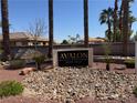 Close up of the Avalon at Seven Hills community sign with stone landscaping and palm trees at 2900 Sunridge Heights Pkwy # 816, Henderson, NV 89052