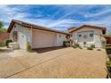 Lovely home with a spacious two-car garage and stamped concrete driveway for added curb appeal at 11342 Early Sun Ct, Las Vegas, NV 89135