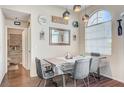 Bright dining room with a chandelier and views at 3150 Soft Breezes Dr # 2018, Las Vegas, NV 89128