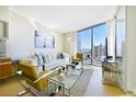 Stylish living room features comfortable seating, modern decor, and a panoramic city view at 3726 Las Vegas Blvd # 2605, Las Vegas, NV 89158