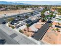 This aerial view captures the well-placed property near amenities and roadways, highlighted by desert landscaping at 6882 Palmyra Ave, Las Vegas, NV 89146