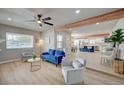 Bright and open living space with hardwood floors, comfortable seating, and easy access to the kitchen at 700 Cactus Ln, Las Vegas, NV 89107