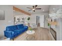 Spacious living area with fireplace, seamlessly blending with other living spaces and decor at 700 Cactus Ln, Las Vegas, NV 89107