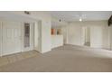 Bright and airy living room with neutral paint and flooring, showcasing a welcoming atmosphere at 8725 W Flamingo Rd # 240, Las Vegas, NV 89147