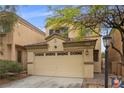 Charming two-story home featuring a spacious two-car garage and well-maintained landscaping at 9060 Watermelon Seed Ave, Las Vegas, NV 89143