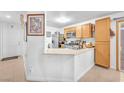 Kitchen features updated countertops, stainless steel appliances, and ample cabinet space at 9958 Fragile Fields St, Las Vegas, NV 89183