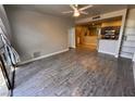 Open living room showcasing wood flooring, neutral walls, and natural lighting at 5150 S Jones Blvd # 105, Las Vegas, NV 89118