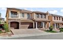 Charming two-story home with a landscaped yard and a three-car garage at 6236 Mount Palomar Ave, Las Vegas, NV 89139