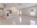 Spacious living room features tile floors, recessed lighting, and neutral paint colors at 7116 Wonderberry St, Las Vegas, NV 89131