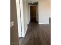 Hallway featuring hard surface flooring and neutral paint at , Las Vegas, NV 89148