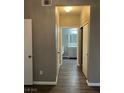 Hallway with view of bathroom, showing flooring and neutral paint at , Las Vegas, NV 89148