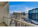 Las Vegas Condo Balcony offering panoramic views of the city skyline under a clear blue sky at 135 E Harmon Ave # 3215, Las Vegas, NV 89109