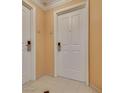 Hallway with a door and an exterior view outside at 145 E Harmon Ave # 3103, Las Vegas, NV 89109