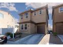 Two-story home featuring a private garage and appealing exterior at 1766 Molly Meadows St, Las Vegas, NV 89115