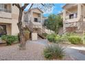 Beautiful community with meticulously maintained landscaping and walkways to each home at 1830 N Buffalo Dr # 2043, Las Vegas, NV 89128