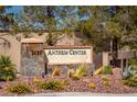 Elegant Anthem Center community sign surrounded by desert landscaping and mature trees at 2585 Shellsburg Ave, Henderson, NV 89052
