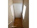 Entryway featuring a white front door, closet, and neutral-toned flooring at 7564 Durham Hall Ave # 201, Las Vegas, NV 89130