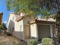 Charming townhouse with a private entrance, single car garage and low-maintenance desert landscaping at 7564 Durham Hall Ave # 201, Las Vegas, NV 89130