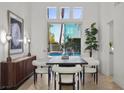 Stylish dining room featuring modern furnishings and an elegant chandelier fixture at 134 Wentworth Dr, Henderson, NV 89074