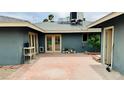 The backyard has a brick patio area and access to a separate building at 1801 Griffith Ave, Las Vegas, NV 89104