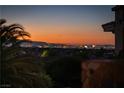 A stunning Las Vegas skyline view at sunset, seen from property at 1800 Melfi Ct, Henderson, NV 89012