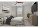 Cozy bedroom features a comfortable bed, stylish decor, soft lighting, and a large window for natural light at 1103 Tektite Ave, Henderson, NV 89011