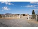 Gated entry leads to this peaceful ranch property with beautiful views at 170 Story Ave, Pahrump, NV 89060