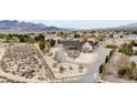 Beautiful ranch home with a circular driveway and mountain views, offering a serene setting at 170 Story Ave, Pahrump, NV 89060