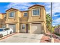 Charming townhome with attached garage and a well-maintained front exterior at 2620 Sierra Seco Ave # 101, Las Vegas, NV 89106