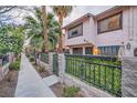 Charming townhome with landscaped walkway and secure gated entrance at 4338 Caliente St # 11, Las Vegas, NV 89119