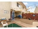 Relaxing back yard with a gravel patio, fence, and an open sky view at 555 Rene Ln, Henderson, NV 89015