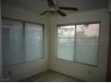 Breakfast nook with a ceiling fan and two large windows at 3041 Casey Dr # 101, Las Vegas, NV 89120