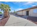 This property features a long driveway, desert landscaping and gated entry at 4137 Buffalo Bill Ave, Las Vegas, NV 89110