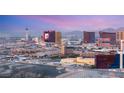 Enjoy Las Vegas skyline from above, showcasing the vibrant city with a backdrop of majestic mountains at 4381 W Flamingo Rd # 57306, Las Vegas, NV 89103