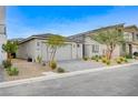 Attractive single story home featuring desert landscaping and a two car garage at 5479 Tamar Ridge Ct, Las Vegas, NV 89141