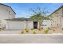 Beautiful single-story home featuring a 2 car garage and drought resistant landscaping at 5479 Tamar Ridge Ct, Las Vegas, NV 89141