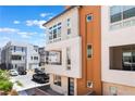 Contemporary-style home featuring clean lines, a balcony, and modern architectural details under a bright sky at 647 Spotted Falcon St, Las Vegas, NV 89138