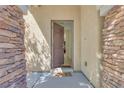 Welcoming entryway with stone accents, neutral tones, and a glimpse into the home's interior at 953 Wagner Valley St, Henderson, NV 89052