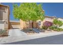 Inviting two-story home featuring a well-maintained front yard and a cozy, welcoming atmosphere at 953 Wagner Valley St, Henderson, NV 89052