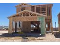 Image of the exterior framing of the new two-story home including garage and stairway at 9548 Hinson St, Las Vegas, NV 89139