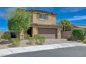 Charming two-story home featuring a well-manicured front yard and inviting curb appeal at 9990 Perth Ct, Las Vegas, NV 89141