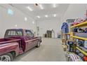 Spacious garage with ample storage and plenty of room for parking vehicles at 789 Goodman Cove St, Henderson, NV 89011