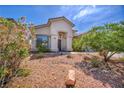 Beautiful single-story home featuring low-maintenance landscaping and a welcoming front entrance at 90 Ancient Hills Ln, Henderson, NV 89074