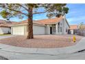 Well-maintained single-story home boasting desert landscaping, tile roofing, and a classic suburban aesthetic at 1472 Recital Way, Las Vegas, NV 89119