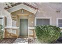 Charming front entrance with well-maintained landscaping and clearly marked address, 2509 at 2509 April Breeze Ln, Henderson, NV 89002