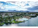 Overhead shot of a lakeside community with sandy beach, palm trees, and community buildings at 3151 Soaring Gulls Dr # 2035, Las Vegas, NV 89128
