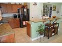 Well-equipped kitchen with stainless steel appliances, granite countertops, and ample storage space at 4770 Lorenzo Way, Pahrump, NV 89061